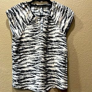 X small Express blouse with cut out detail on neckline. Never worn
